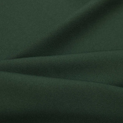 Ткань костюмная 21010 2076, 225 гр/м2, шир.150см, цвет т.зеленый - купить в Уссурийске. Цена 390.73 руб.